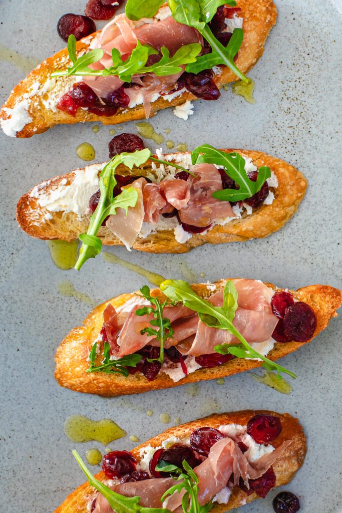 Prosciutto Crostini with Dried Cranberries and Goat Cheese x Chef Curtis Stone - Cobram Estate